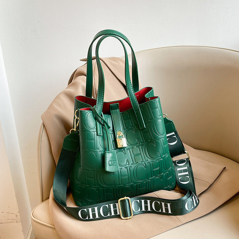 Letter Embossed Solid Color Fashion Retro Classic One-shoulder Portable Commuter Bucket Bag