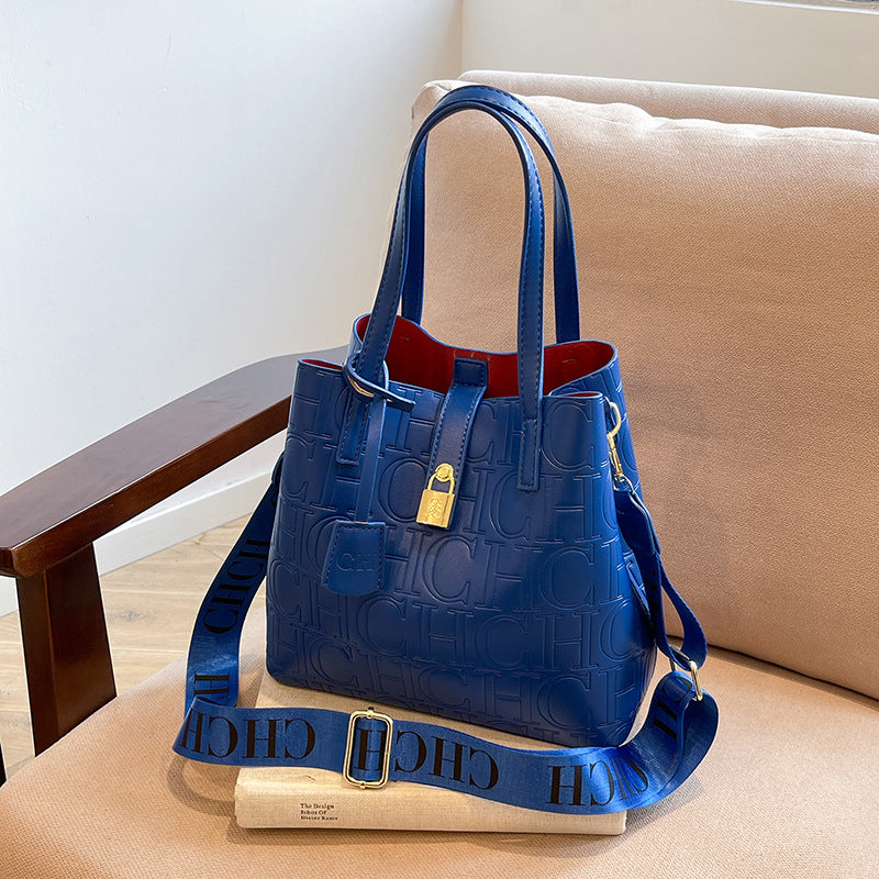 Letter Embossed Solid Color Fashion Retro Classic One-shoulder Portable Commuter Bucket Bag